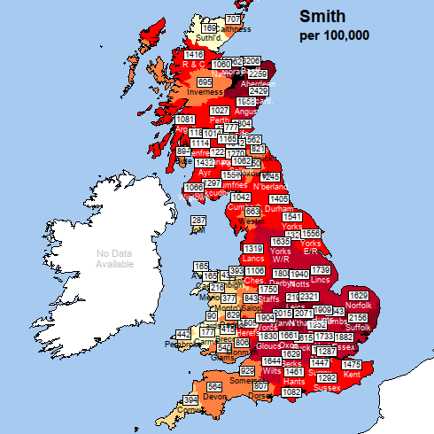 Map of Britain with title "Smith per 100,000". The whole of Britain is shaded and most English and Scottish counties are shaded mid red or darker shades of red or black. Counties in Wales, south-west England, Sutherland and Caithness in Scotland and a few other counties have lighter shading.