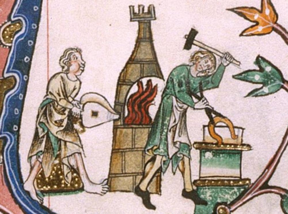Manuscript illustration showing one person working bellows for a forge and another holding tongs and a raised hammer.