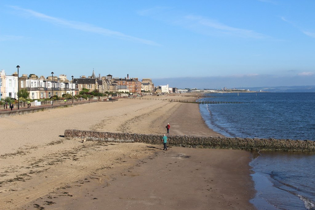 beach with a row of buildings behind