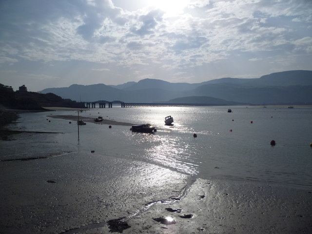 Wide river estuary with hills in the background on the opposite shore of the river